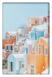 A light and airy photograph of a hillside in Santorini, featuring pastel-colored houses in shades of pink, blue, orange, and white, bathed in soft sunlight.